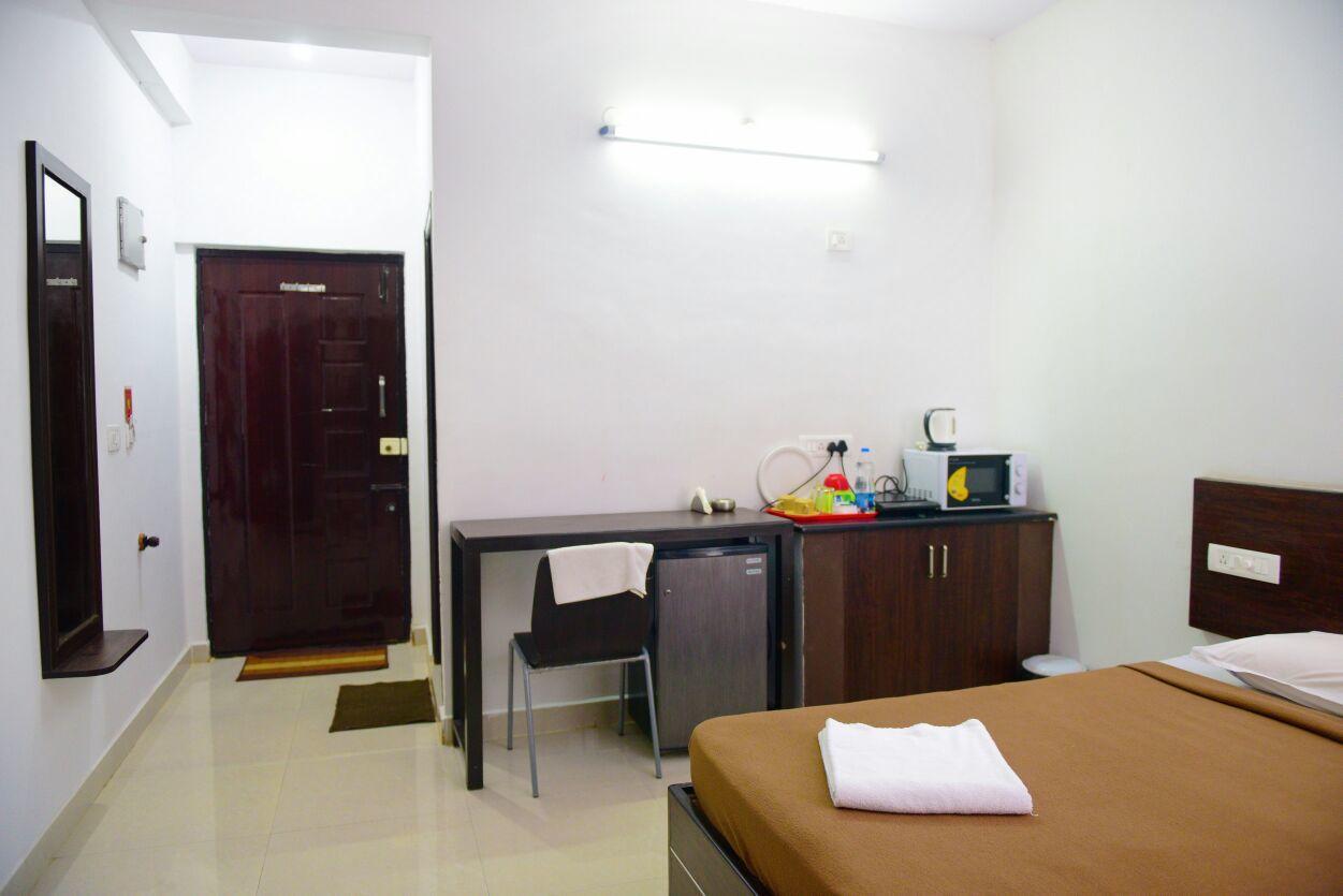 Varsha Enclave- Trinity House Aparthotel Mysore Exterior photo